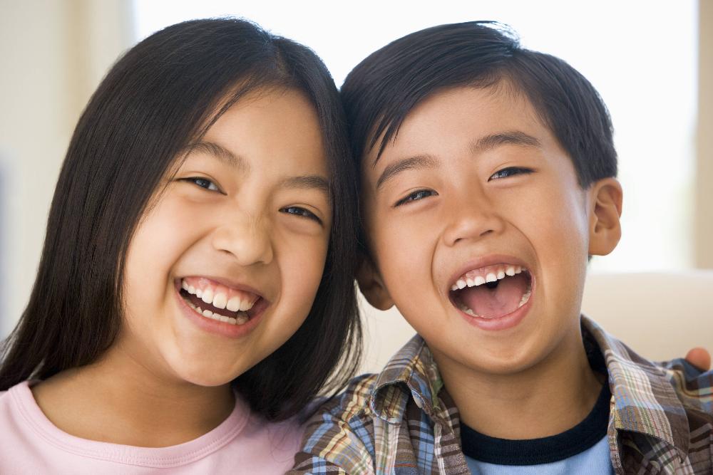two children laughing | bloomington indiana dentist