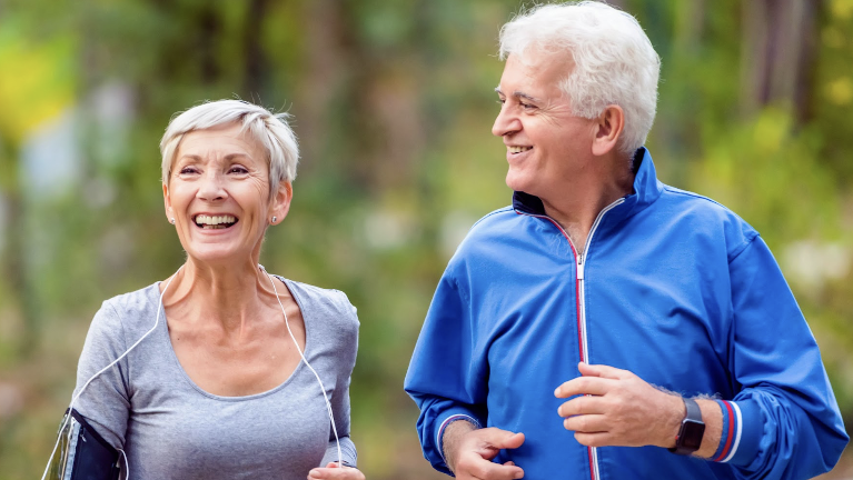 older couple jogging outside | dentures bloomington in