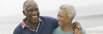 older couple hugging | dental office bloomington in